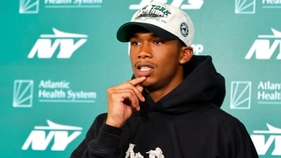 New York Jets wide receiver Garrett Wilson answers questions during a news conference at NFL football practice (AP) New York Jets wide receiver Garrett Wilson answers questions during a news conference at NFL football practice (AP)
