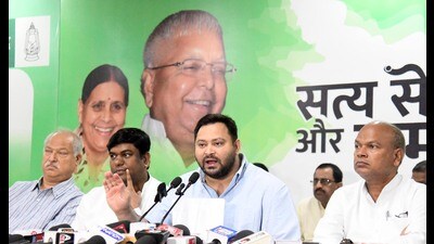 Leader of Opposition in Bihar Assembly and RJD leader Tejashwi Yadav addresses the Grand Alliance press conference at his residence at Polo Road in Patna on Sunday. (Santosh Kumar/ht) Leader of Opposition in Bihar Assembly and RJD leader Tejashwi Yadav addresses the Grand Alliance press conference at his residence at Polo Road in Patna on Sunday. (Santosh Kumar/ht)