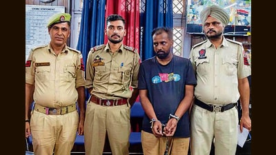 One of the four hired killers in police custody. (HT Photo)
