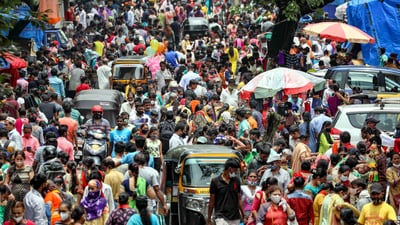 A crowded market in Mumbai. (PTI File Photo) A crowded market in Mumbai. (PTI File Photo)