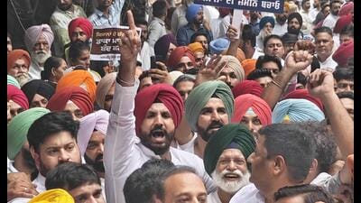 Punjab Congress president Amarinder Singh Raja Warring, along with other protesters, during a demonstration in Ludhiana on Monday. (Gurpreet Singh/HT) Punjab Congress president Amarinder Singh Raja Warring, along with other protesters, during a demonstration in Ludhiana on Monday. (Gurpreet Singh/HT)