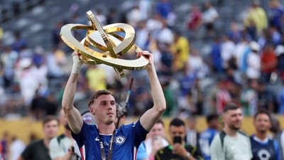 Chelsea's Cole Palmer celebrates with the trophy after winning the FIFA Club World Cup (REUTERS)