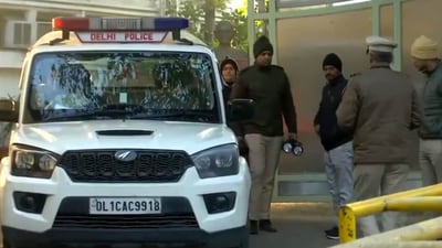 Police officials outside a school after it received bomb threat email. (ANI)