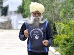 Fauja Singh, who was 114 years old, died after being hit by an unidentified vehicle while crossing a road at his native Bias village in Jalandhar district on Monday afternoon. Fauja Singh, who was 114 years old, died after being hit by an unidentified vehicle while crossing a road at his native Bias village in Jalandhar district on Monday afternoon.