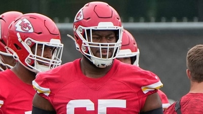 Kansas City Chiefs guard Trey Smith (65) walks to a drill with teammates during the NFL football team's practice Tuesday, June 17, 2025, in Kansas City. (AP) Kansas City Chiefs guard Trey Smith (65) walks to a drill with teammates during the NFL football team's practice Tuesday, June 17, 2025, in Kansas City. (AP)