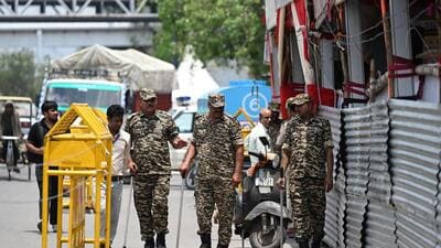 Delhi Police along with Paramilitary officials deployed over the route of Kanwar Yatra near Shahdra in New Delhi on Tuesday. (Sanchit Khanna/ Hindustan Times) Delhi Police along with Paramilitary officials deployed over the route of Kanwar Yatra near Shahdra in New Delhi on Tuesday. (Sanchit Khanna/ Hindustan Times)