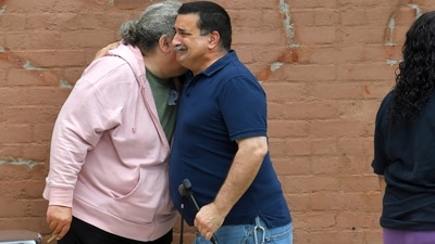 People were seen being emotional and hugging the surviving residents of the facility. (AP) People were seen being emotional and hugging the surviving residents of the facility. (AP)