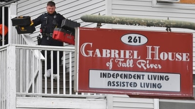 Law enforcement officials were seen removing boxes of patient medications from the Gabriel House assisted living facility. (AP) Law enforcement officials were seen removing boxes of patient medications from the Gabriel House assisted living facility. (AP)