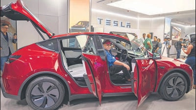 Mumbai, India - July 15, 2025: Tesla has inaugurated its first experience centre showroom in Mumbai's Bandra Kurla Complex in Mumbai, India, on Tuesday, July 15, 2025. (Photo by Satish Bate/ Hindustan Times) (Hindustan Times) Mumbai, India - July 15, 2025: Tesla has inaugurated its first experience centre showroom in Mumbai's Bandra Kurla Complex in Mumbai, India, on Tuesday, July 15, 2025. (Photo by Satish Bate/ Hindustan Times) (Hindustan Times)