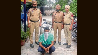 One of the accused in police custody in Ludhiana on Tuesday. (HT Photo) One of the accused in police custody in Ludhiana on Tuesday. (HT Photo)