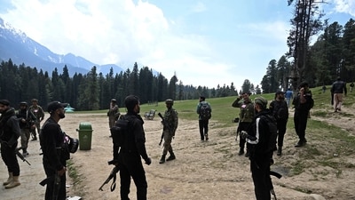Security personnel at the site of the terror attack in Jammu and Kashmir's Pahalgam. (AFP) Security personnel at the site of the terror attack in Jammu and Kashmir's Pahalgam. (AFP)