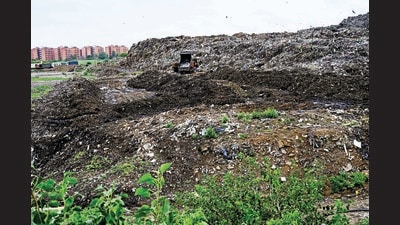 While the Chandigarh MC was clearing two mountains of legacy waste, of five lakh MT and eight lakh MT, a third mountain holding nearly 1.25 lakh MT waste had cropped up. It is here that the one lakh MT waste is still to be cleared. (HT File) While the Chandigarh MC was clearing two mountains of legacy waste, of five lakh MT and eight lakh MT, a third mountain holding nearly 1.25 lakh MT waste had cropped up. It is here that the one lakh MT waste is still to be cleared. (HT File)