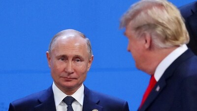 US President Donald Trump and Russia's President Vladimir Putin are seen during the G20 leaders summit in Buenos Aires, Argentina November 30, 2018 (REUTERS)