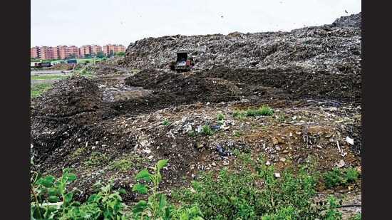 While the Chandigarh MC was clearing two mountains of legacy waste, of five lakh MT and eight lakh MT, a third mountain holding nearly 1.25 lakh MT waste had cropped up. It is here that the one lakh MT waste is still to be cleared. (HT File)
