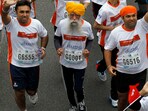 Centenarian runner Fauja Singh (centre), seen during a 2013 race in Hong Kong, was killed in a recent road accident in Punjab. Centenarian runner Fauja Singh (centre), seen during a 2013 race in Hong Kong, was killed in a recent road accident in Punjab.