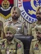Senior Superintendent of Police (SSP) Harvinder Singh (seated third from left) addressing a press conference in Jalandhar on Wednesday regarding the arrest of a Canada-based NRI, who drove the SUV that hit Fauja Singh, on Monday leading to the death of the centenarian marathon runner. (PTI Photo) Senior Superintendent of Police (SSP) Harvinder Singh (seated third from left) addressing a press conference in Jalandhar on Wednesday regarding the arrest of a Canada-based NRI, who drove the SUV that hit Fauja Singh, on Monday leading to the death of the centenarian marathon runner. (PTI Photo)