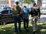 A new ICE policy under the Trump administration mandates detention without bond hearings for undocumented immigrants, impacting long-time residents. (Photo by JOHN MOORE / GETTY IMAGES NORTH AMERICA / Getty Images via AFP) A new ICE policy under the Trump administration mandates detention without bond hearings for undocumented immigrants, impacting long-time residents. (Photo by JOHN MOORE / GETTY IMAGES NORTH AMERICA / Getty Images via AFP)