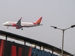 An Airbus A320 aircraft, operated by Air India Ltd, prepares to land at Indira Gandhi International Airport in New Delhi An Airbus A320 aircraft, operated by Air India Ltd, prepares to land at Indira Gandhi International Airport in New Delhi