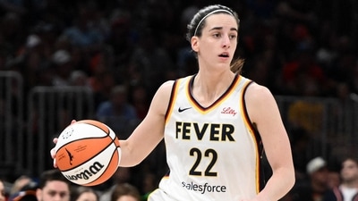 Caitlin Clark #22 of the Indiana Fever drives to the basket against the Connecticut Sun during the first half at the TD Garden on July 15, 2025. (Photo by Brian Fluharty / GETTY IMAGES NORTH AMERICA / Getty Images via AFP) (Getty Images via AFP) Caitlin Clark #22 of the Indiana Fever drives to the basket against the Connecticut Sun during the first half at the TD Garden on July 15, 2025. (Photo by Brian Fluharty / GETTY IMAGES NORTH AMERICA / Getty Images via AFP) (Getty Images via AFP)