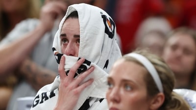 Indiana Fever's Caitlin Clark sits on the bench after a groin injury (AP) Indiana Fever's Caitlin Clark sits on the bench after a groin injury (AP)