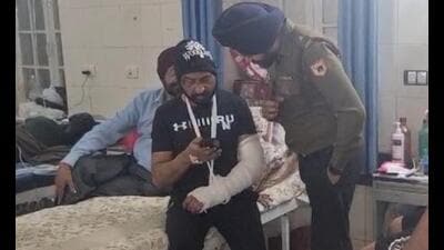 Colonel Bath and his 21-year-old son Angad were allegedly assaulted by police officers over a parking dispute outside a roadside eatery near Government Rajindra Hospital in Patiala on March 13. (HT) Colonel Bath and his 21-year-old son Angad were allegedly assaulted by police officers over a parking dispute outside a roadside eatery near Government Rajindra Hospital in Patiala on March 13. (HT)