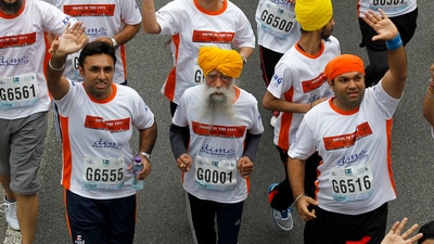 Centenarian runner Fauja Singh (centre), seen during a 2013 race in Hong Kong, was killed in a recent road accident in Punjab. (AP File) Centenarian runner Fauja Singh (centre), seen during a 2013 race in Hong Kong, was killed in a recent road accident in Punjab. (AP File)