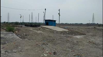 The flattened site (above) is now set to be reused for controlled silt disposal, said MCD officials. (HT Photo) The flattened site (above) is now set to be reused for controlled silt disposal, said MCD officials. (HT Photo)