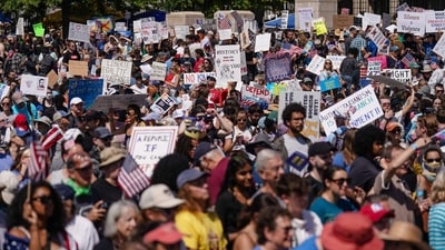 Good Trouble protests: Tens of thousands are set to protest Trump administration policies at over 1,600 locations, marking the sixth anniversary of civil rights legend John Lewis's passing. (AFP) Good Trouble protests: Tens of thousands are set to protest Trump administration policies at over 1,600 locations, marking the sixth anniversary of civil rights legend John Lewis's passing. (AFP)