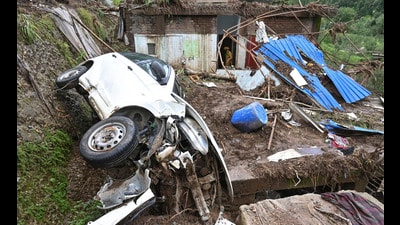 Wreckage of a vehicle and debris at an affected site following recent cloudbursts and landslides, at Seraj valley in Mandi district, HP, on Wednesday. (PTI) Wreckage of a vehicle and debris at an affected site following recent cloudbursts and landslides, at Seraj valley in Mandi district, HP, on Wednesday. (PTI)