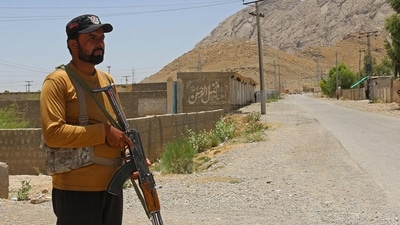A security personnel stands guard along a street near the site of a school bus bombing in the Khuzdar district of Balochistan province. (AFP/File) A security personnel stands guard along a street near the site of a school bus bombing in the Khuzdar district of Balochistan province. (AFP/File)