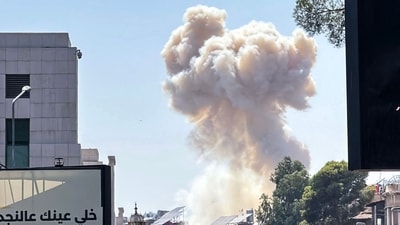 Smoke billows following Israeli strikes near the Syrian army and defence ministry headquarters in Damascus on July 16. (AFP) Smoke billows following Israeli strikes near the Syrian army and defence ministry headquarters in Damascus on July 16. (AFP)