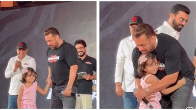 Salman Khan shared an adorable moment with a young fan on stage. Salman Khan shared an adorable moment with a young fan on stage.