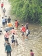 A view of the waterlogged stretch on the NH-48 service road during heavy rain in Gurugram on Thursday, July 10. (Parveen Kumar/Hindustan Times)