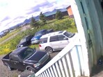 A snippet from a video shows a house and cars shaking during an earthquake in Alaska. A snippet from a video shows a house and cars shaking during an earthquake in Alaska.
