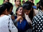 Relatives and friends pay their last respects to pilot Clive Kunder, who died in the Air India crash shortly after takeoff in Ahmedabad.