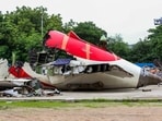 Wreckage of Air India's Boeing 787-8 aircraft, which was operating flight AI 171 from Ahmedabad to London, placed under tight security, seen a month after the tragedy, in Ahmedabad. Wreckage of Air India's Boeing 787-8 aircraft, which was operating flight AI 171 from Ahmedabad to London, placed under tight security, seen a month after the tragedy, in Ahmedabad.