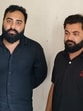 Priyanjal Sharma and Anshuman Tiwari in police custody on Wednesday. (HT Photo) Priyanjal Sharma and Anshuman Tiwari in police custody on Wednesday. (HT Photo)