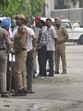 Punjab Police personnel deployed near the residence of SAD leader Bikram Singh Majithia at Green Avenue in Amritsar on Wednesday. (Sameer Sehgal/HT)