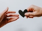 The Astronomer CEO Andy Byron and Kristin Cabot hid their faces when they were shown on the kiss cam. Image for representation.