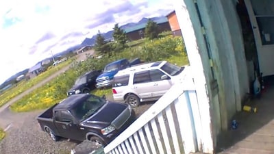 A snippet from a video shows a house and cars shaking during an earthquake in Alaska. (X/@AKearthquake) A snippet from a video shows a house and cars shaking during an earthquake in Alaska. (X/@AKearthquake)