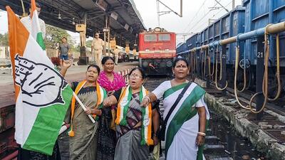 Congress workers block a railway track during a bandh called by several opposition parties in protest over the death of a college student in Odisha's Balasore. (PTI) Congress workers block a railway track during a bandh called by several opposition parties in protest over the death of a college student in Odisha's Balasore. (PTI)
