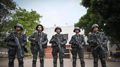 Delhi Police women Swat team seen in action during a mock drill resembling the scenario of a terror attack. (HT file photo)