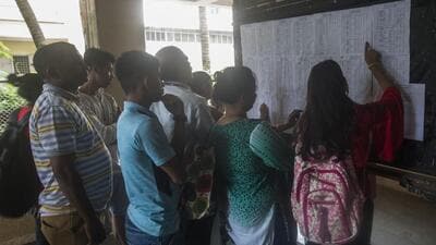 Mumbai, India - July 5, 2018: Students and parents check the first merit list of FYJC at Ruia college, Matunga in Mumbai, India, on Thursday, July 5, 2018. (Photo by Pratik Chorge/Hindustan Times) (Pratik Chorge/HT Photo) Mumbai, India - July 5, 2018: Students and parents check the first merit list of FYJC at Ruia college, Matunga in Mumbai, India, on Thursday, July 5, 2018. (Photo by Pratik Chorge/Hindustan Times) (Pratik Chorge/HT Photo)