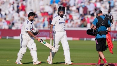 India's batters Rishabh Pant and KL Rahul walk off the field at the end of the second day's play at Lord's. (PTI) India's batters Rishabh Pant and KL Rahul walk off the field at the end of the second day's play at Lord's. (PTI)