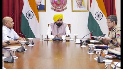 Punjab chief minister Bhagwant Mann during the meeting with top officials of Punjab Police to review security at Golden Temple. (PTI)