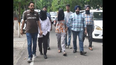 The accused in police custody in Ludhiana on Thursday. (Gurpreet Singh/HT)