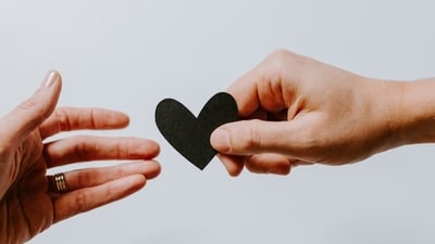 The Astronomer CEO Andy Byron and Kristin Cabot hid their faces when they were shown on the kiss cam. Image for representation. (Unsplash) The Astronomer CEO Andy Byron and Kristin Cabot hid their faces when they were shown on the kiss cam. Image for representation. (Unsplash)