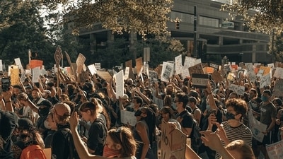 Good Trouble Lives On protests today: Schedule, locations, and details on anti-Trump rallies across US (Unsplash - representational image) Good Trouble Lives On protests today: Schedule, locations, and details on anti-Trump rallies across US (Unsplash - representational image)