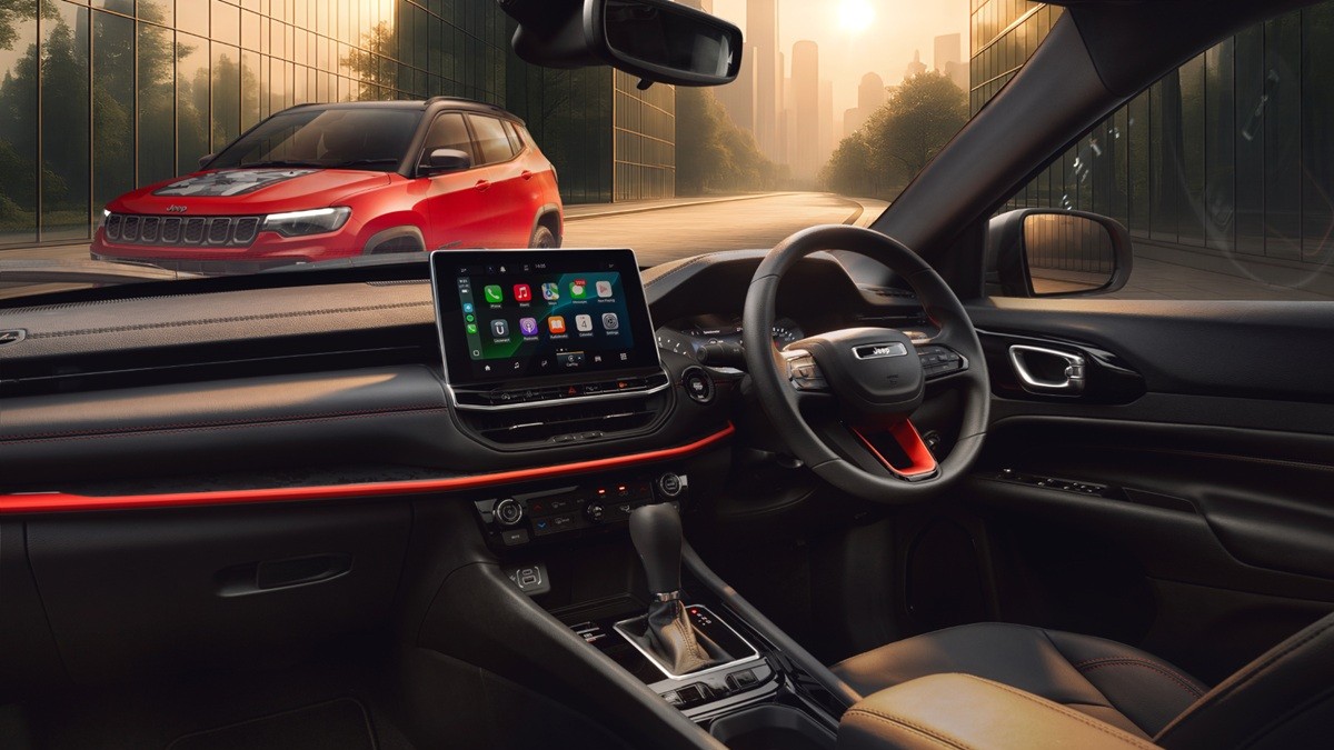 The Jeep Compass Trail Edition gets black leatherette upholstery, red contrast stitching, camouflage-themed graphics and more The Jeep Compass Trail Edition gets black leatherette upholstery, red contrast stitching, camouflage-themed graphics and more
