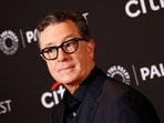 CBS's decision to end The Late Show with Stephen Colbert in May 2026 faces backlash, with Senator Elizabeth Warren suggesting political motives tied to a recent $16M settlement with Trump. (Photo by Michael Tran / AFP)
